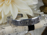 Chase Your Dreams Stamped Aluminum Cuff
