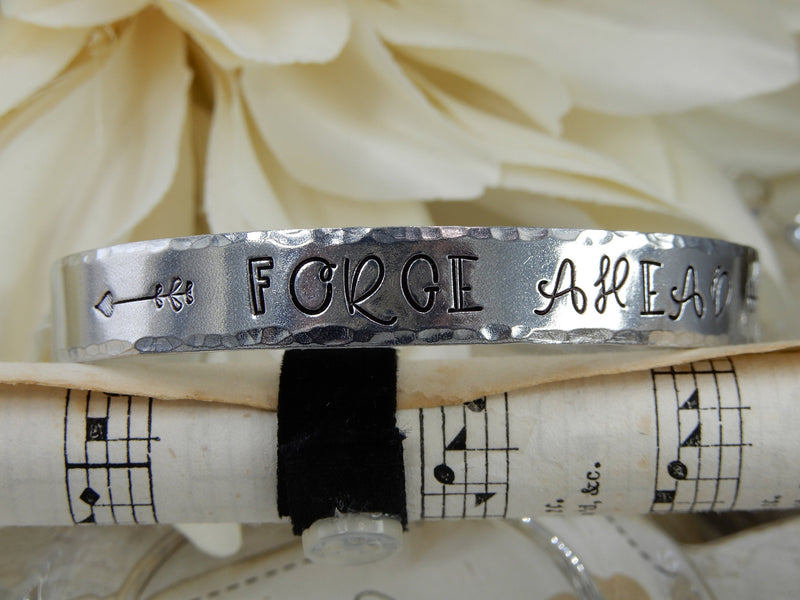 Forge Ahead Stamped Aluminum Cuff